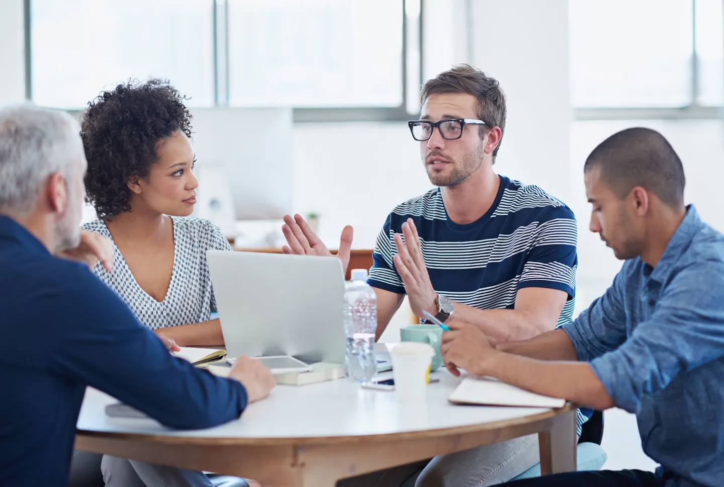 Cross-functional software development team collaborating on exploratory testing strategies